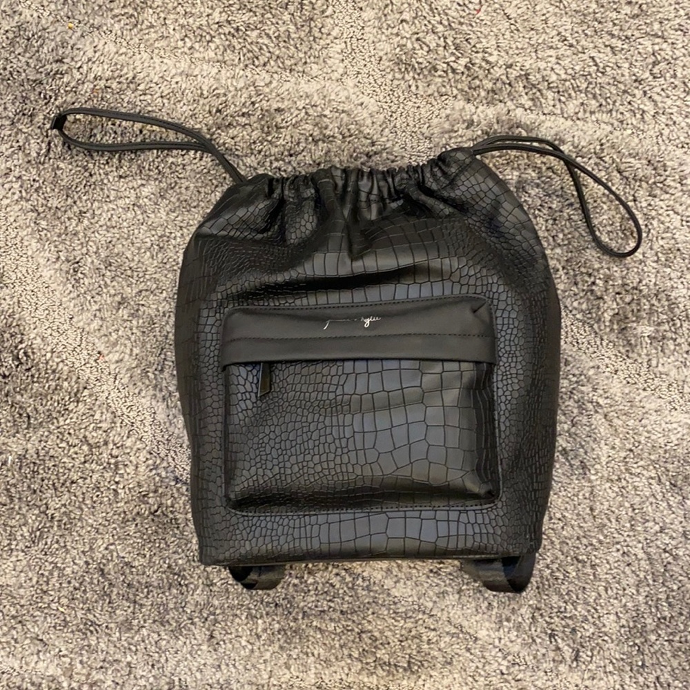 Black drawstring backpack